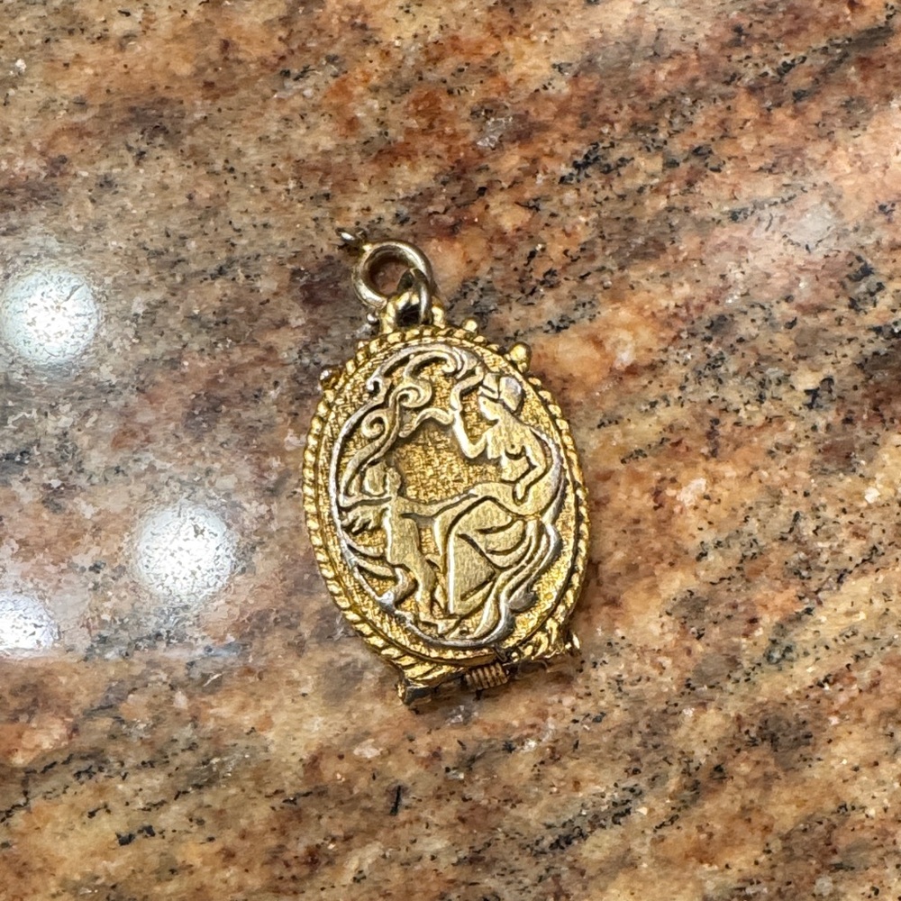 Vintage Gold plated Sachet Renaissance revival Locket seated woman.